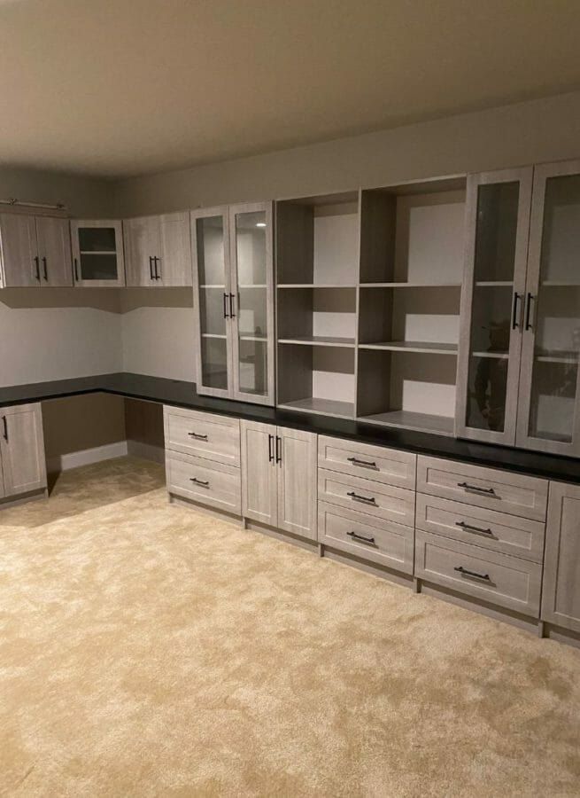 Home office L-shaped cabinets, installed by Closets For Less