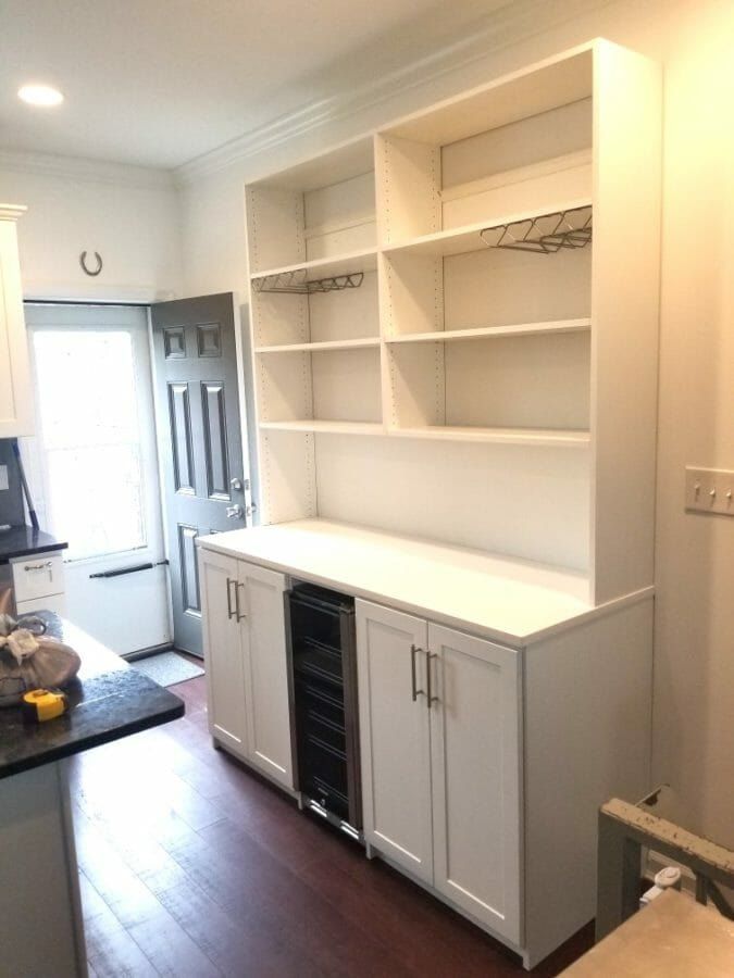White built-in coffee bar with open shelving