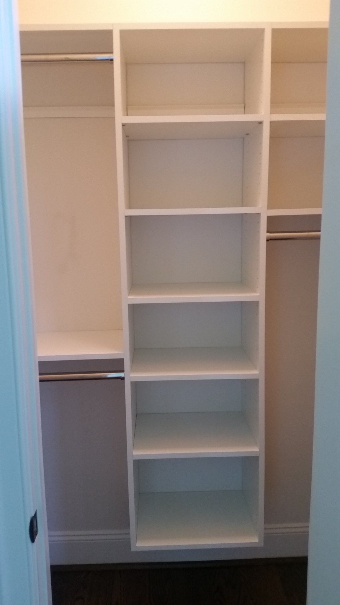 Reach-in closet tower double hang, installed by Closets For Less