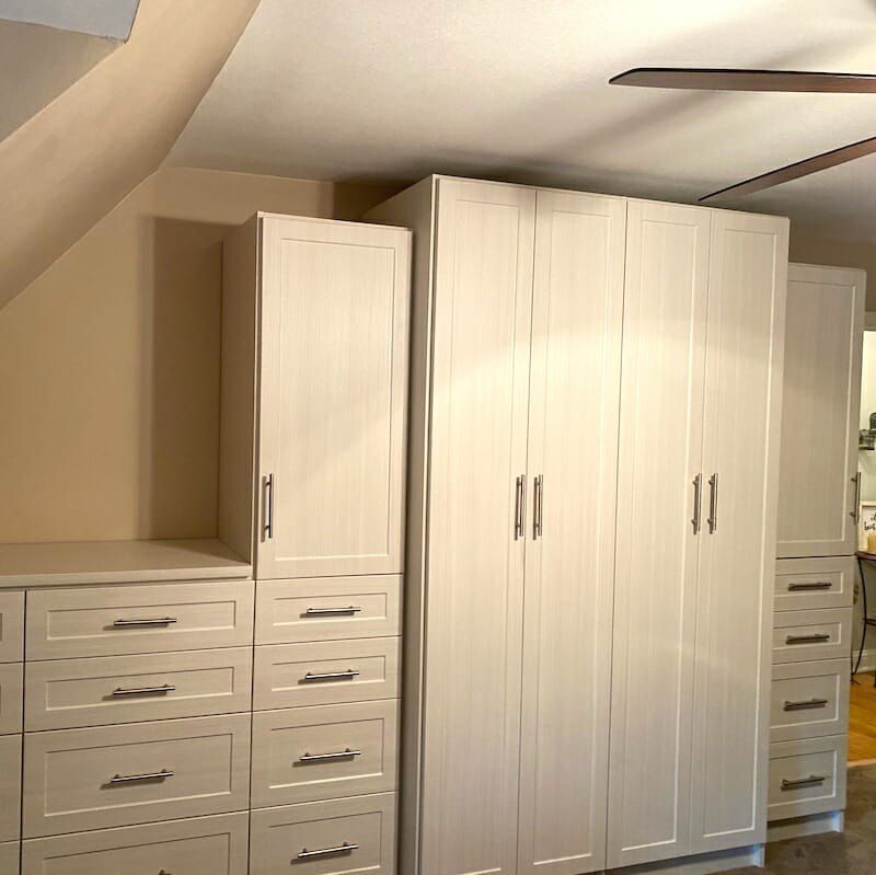 Wardrobe cabinets built under a sloped ceiling